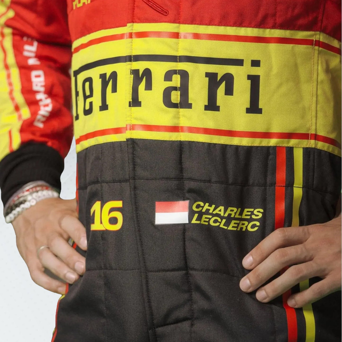 2023 Charles Leclerc Ferrari F1 Monza GP special edition race suit with red, white, and green accents and official sponsor logos