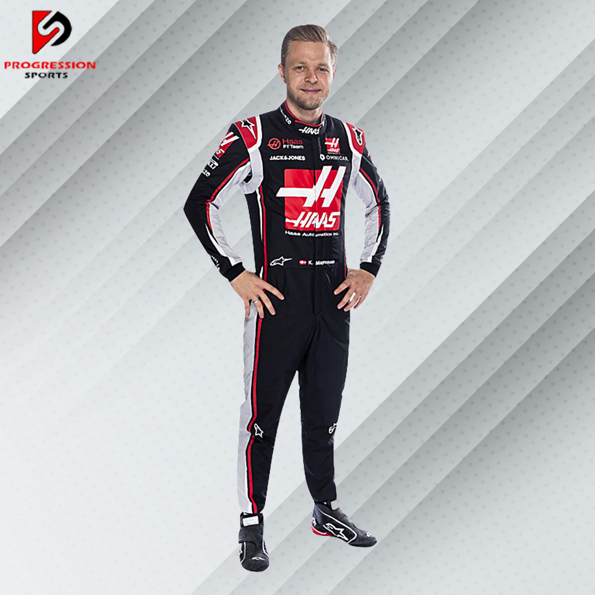 2022 Kevin Magnussen Haas F1 race suit in white with red and black accents featuring Haas, 1&1, and team sponsor logos

