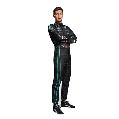 Person wearing a black racing suit with visible branding on a white background