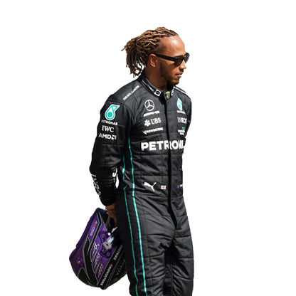 Person wearing a Formula 1 racing suit with visible branding on a white background