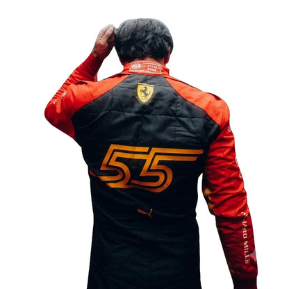 2023 Carlos Sainz Spain GP Ferrari F1 Race Suit featuring yellow shoulder striping, Spanish flag waist badge, and driver number 55