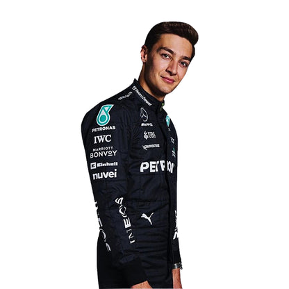 Person wearing a black racing suit with various sponsor logos on a light gray background