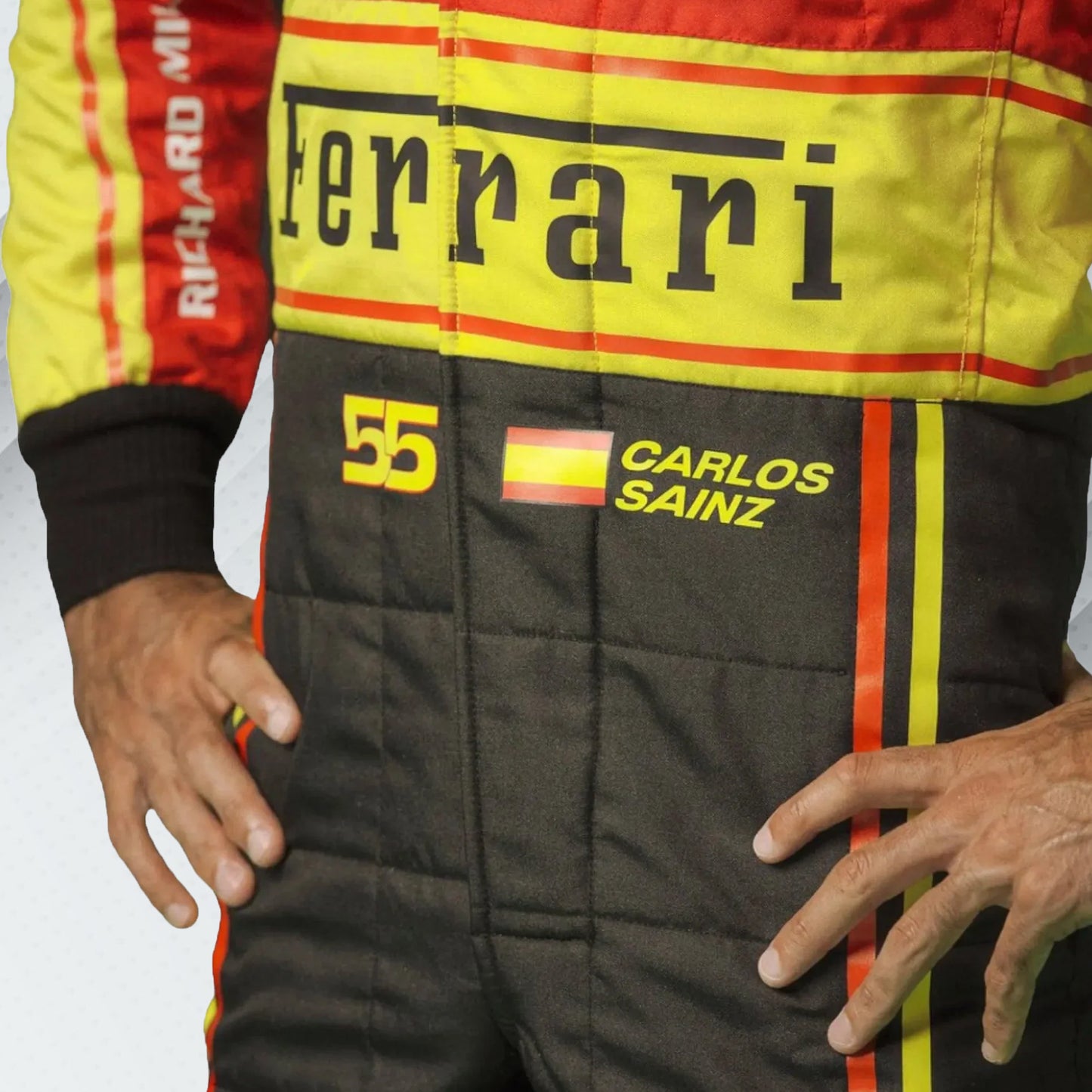 2023 Carlos Sainz Ferrari F1 Monza GP special edition race suit with red, white, and green accents and official sponsor logos