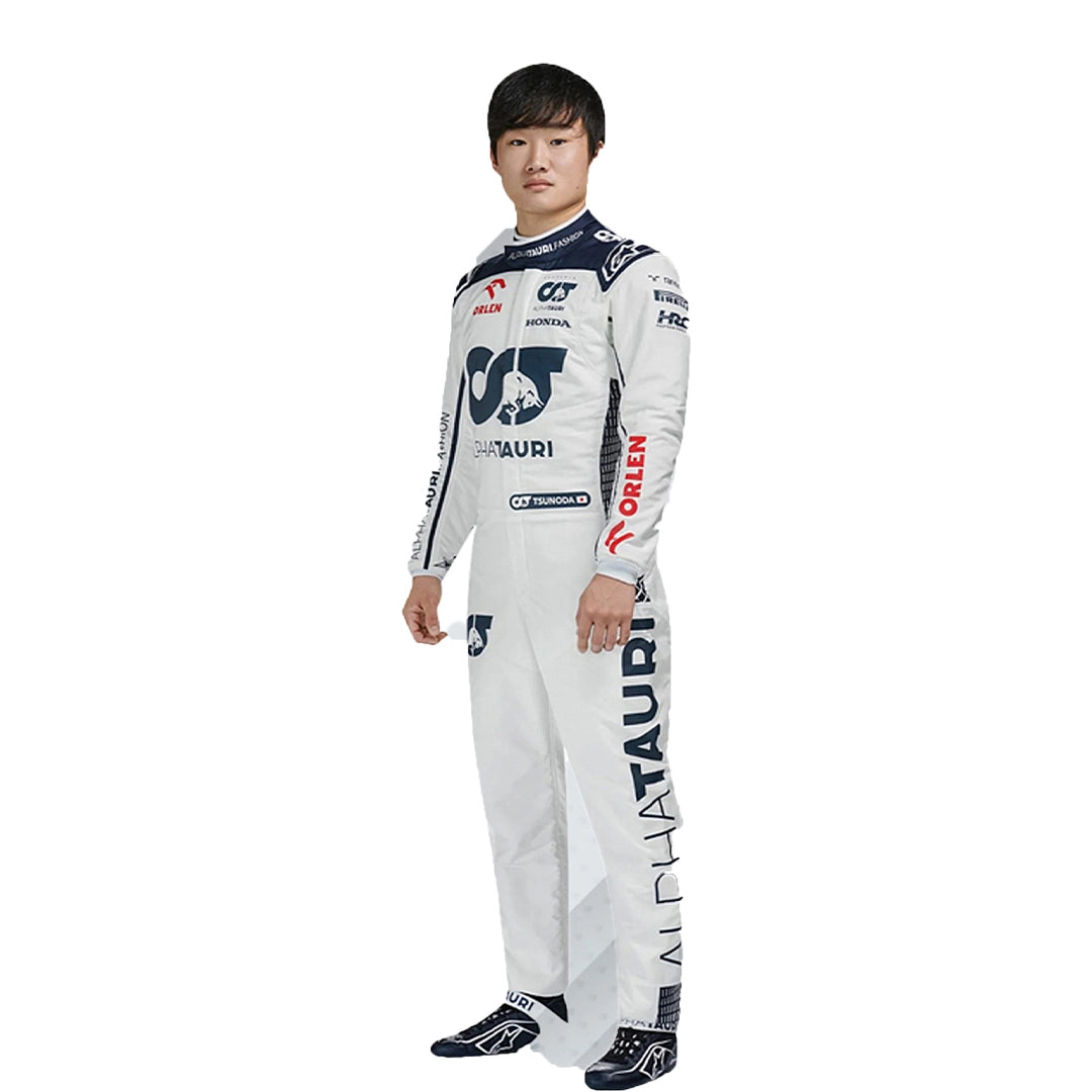 Person wearing a white racing suit with various logos on a white background