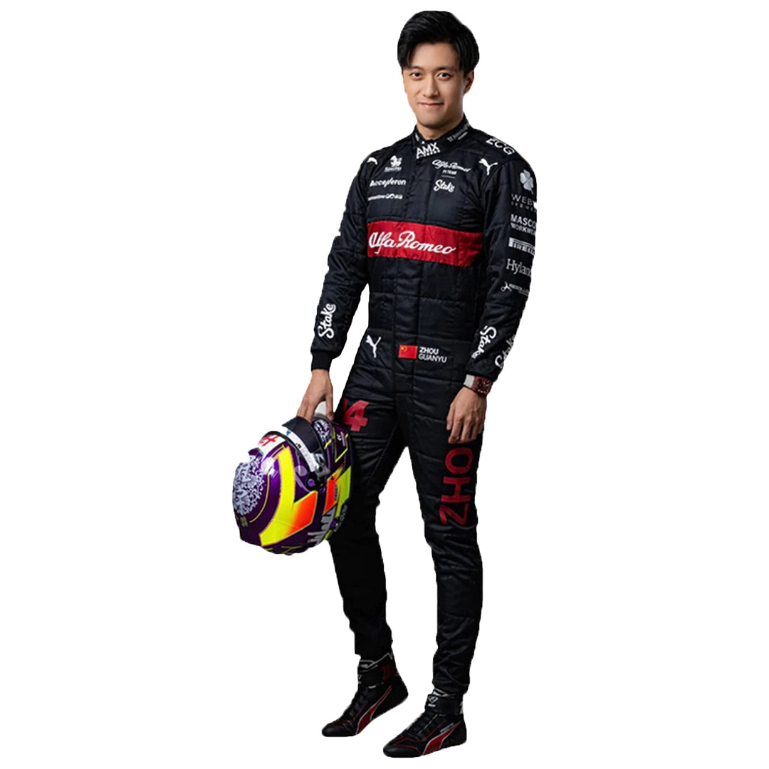 Person wearing a racing suit holding a helmet on a white background