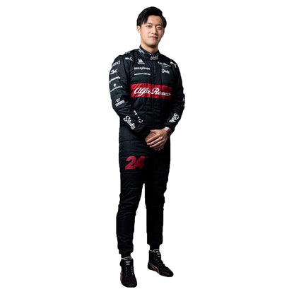 Person wearing a black racing suit with Alfa Romeo branding on a white background