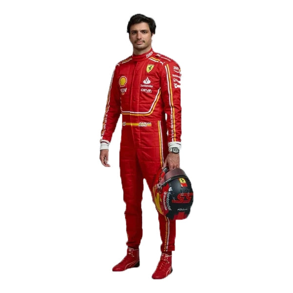 Person wearing a red racing suit with sponsor logos, holding a helmet on a white background