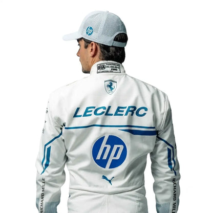 2025 Charles Leclerc Monaco GP Ferrari F1 Race Suit in white featuring blue side accents, HP sponsor graphics, Monegasque flag waist badge, and driver number 16