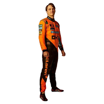 2025 Oscar Piastri F1 Race Suit Kit featuring papaya orange and dark charcoal race suit, black and orange racing gloves, and low-profile driving shoes