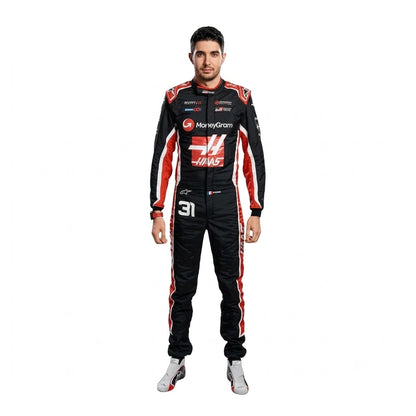 2025 Esteban Ocon Haas F1 Race Suit in white and dark navy standing full length view