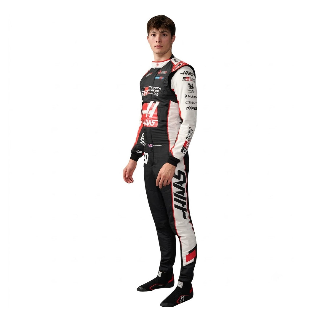 2026 Ollie Bearman Haas F1 Race Suit in black white and red standing profile view