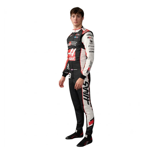 2026 Ollie Bearman Haas F1 Race Suit in black white and red standing profile view