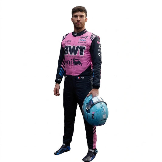 2026 Pierre Gasly F1 Race Suit in pink and black Alpine inspired livery front view holding helmet