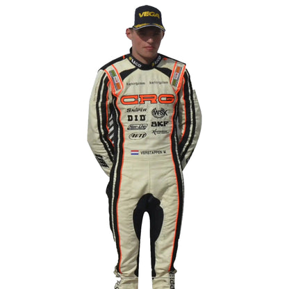 Person wearing a racing suit with various sponsor logos on a white background