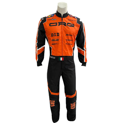 Orange and black racing suit on a mannequin with visible branding against a white background