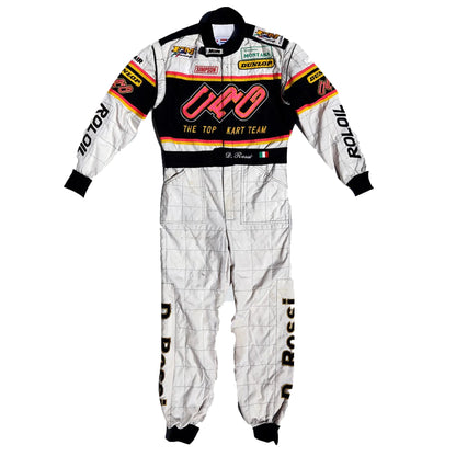 Racing suit with various sponsor logos on a white background