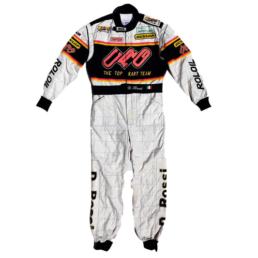 Racing suit with various sponsor logos on a white background