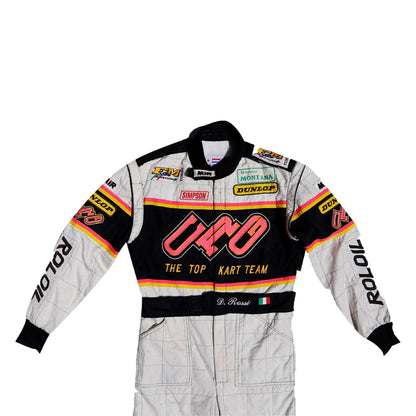 Racing suit with various brand logos on a white background