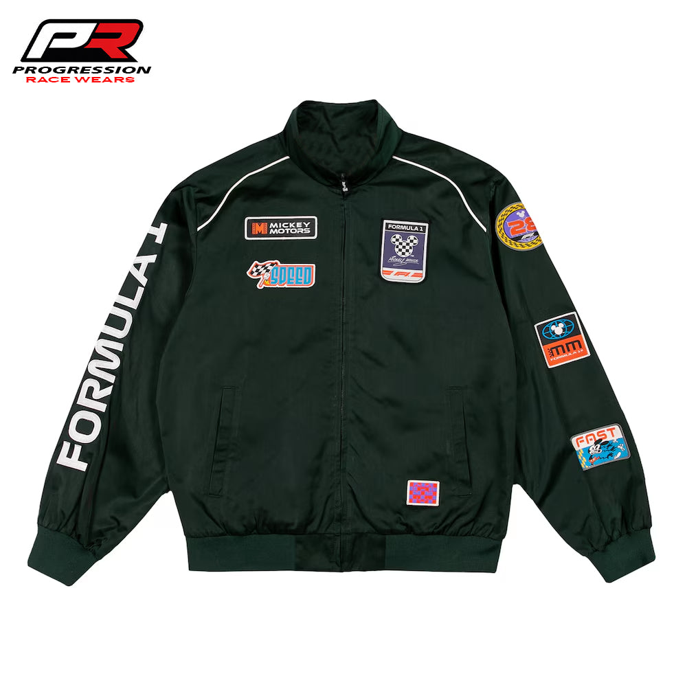 Black racing jacket with various patches and 'Progression Race Wear' branding on a white background