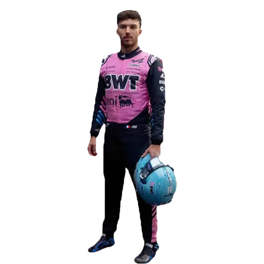 Person wearing a pink and black racing suit with a helmet on a white background