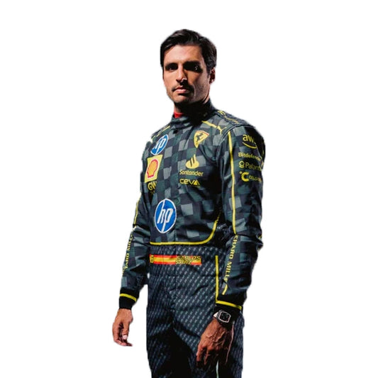 Person wearing a racing suit with various sponsor logos on a white background