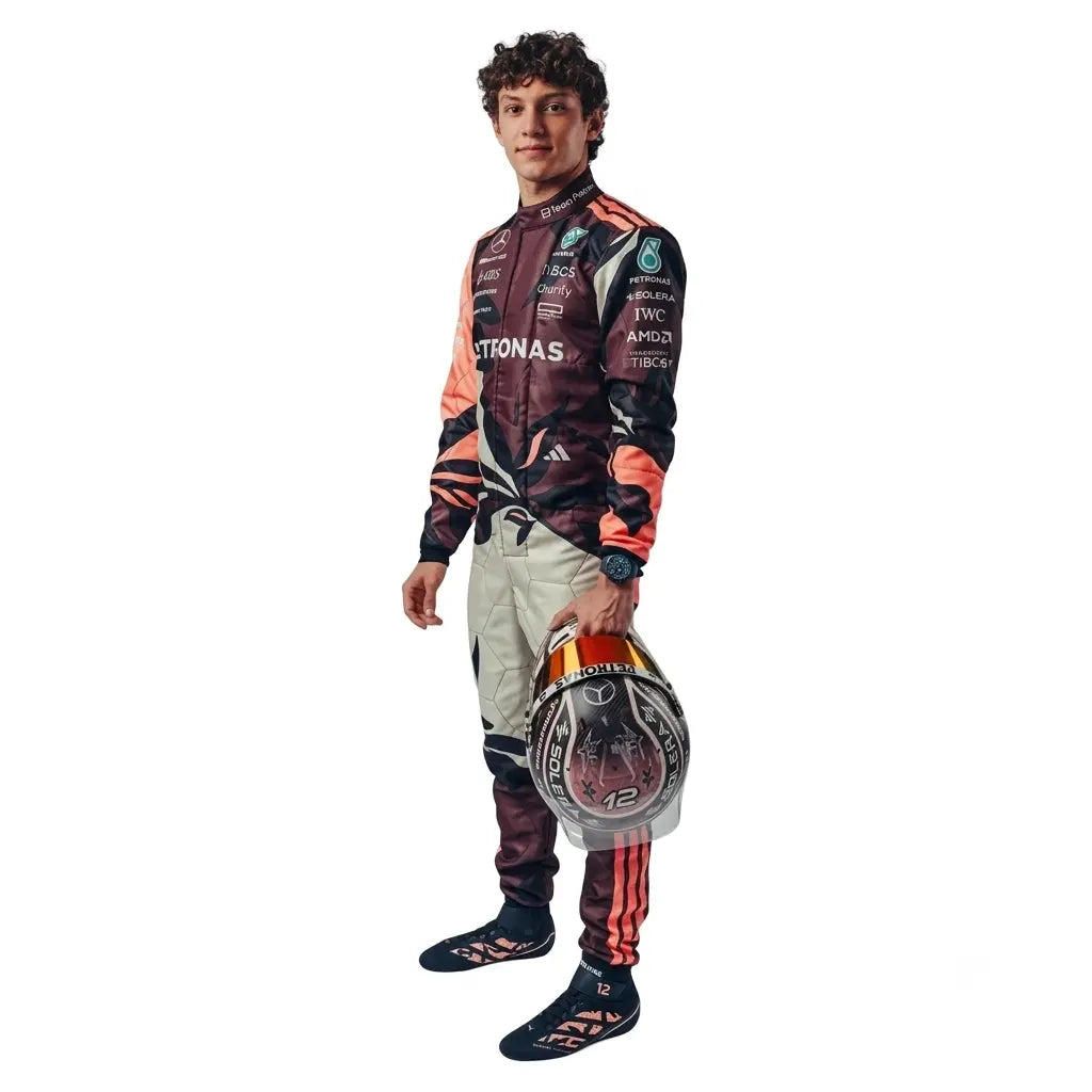 2025 Andrea Kimi Antonelli Mercedes F1 Race Suit in maroon and white standing 3/4 front view holding helmet