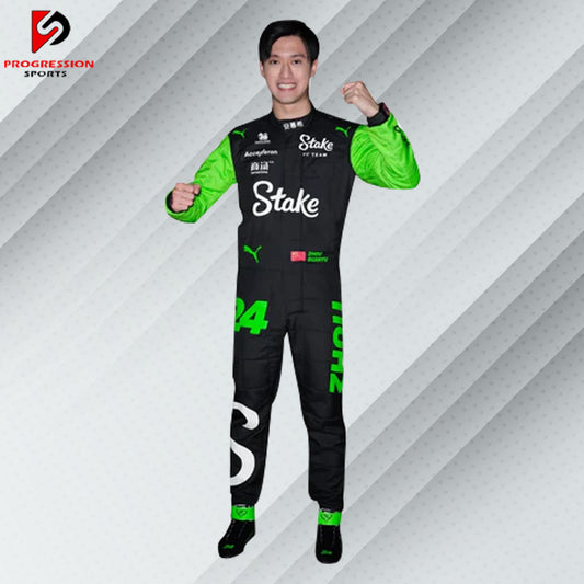 2024 Zhou Guanyu Stake F1 race suit in black and green with Stake, Kick, and Sauber sponsor logos

